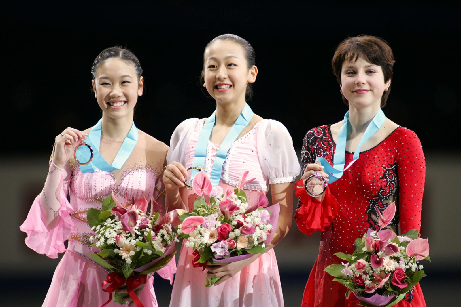 Asada won the Grand Prix of Figure Skating Final in December 2005, defeating Irina Slutskaya of Russia, right, considered a leading contender for the gold medal at the Torino Winter Games, held just two months later. 